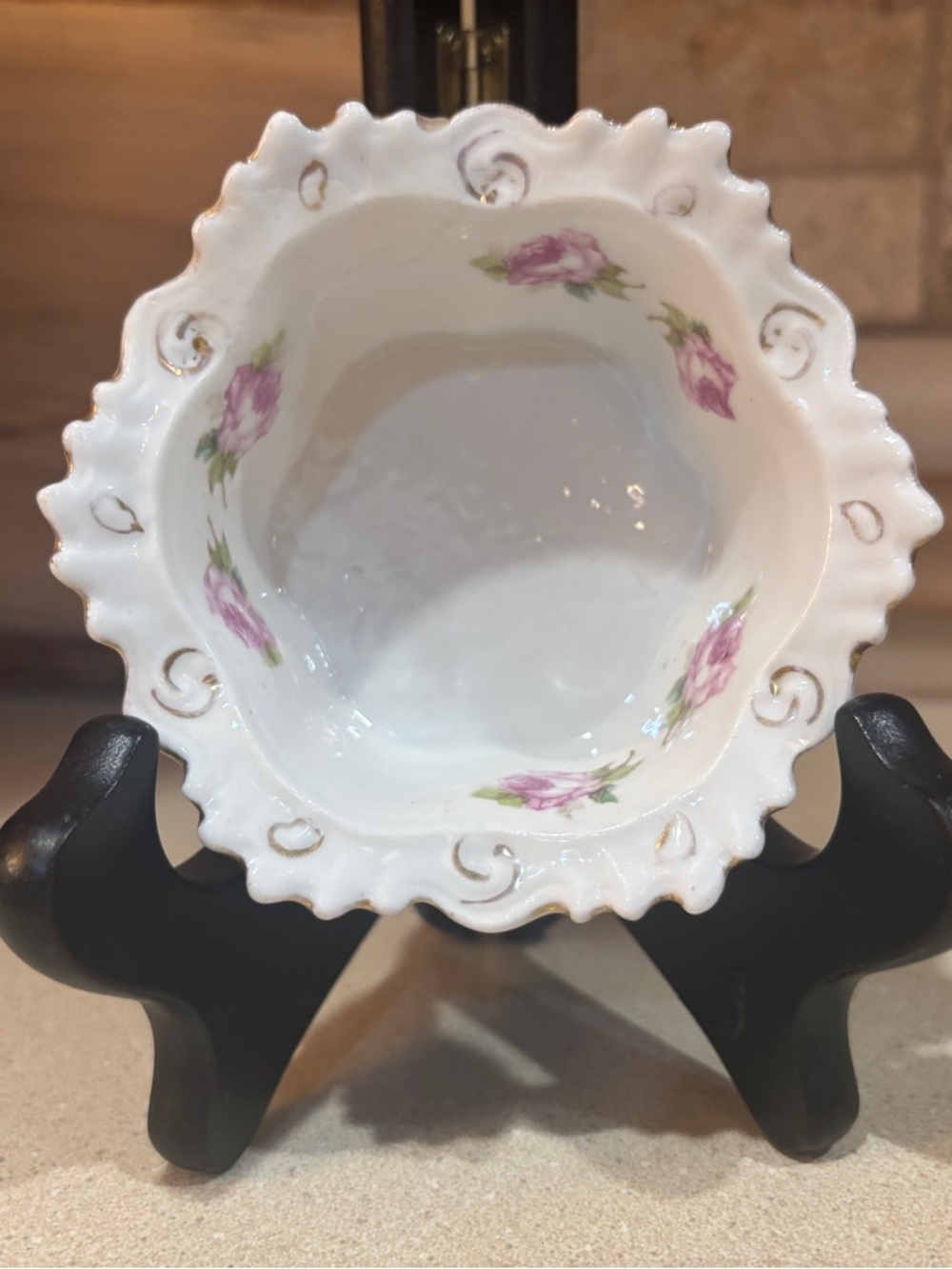 A vintage porcelain dish, likely a custard cup, candy dish, or trinket bowl.